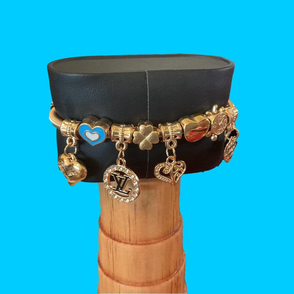New, fashion bracelet, gold tone with rhinestones, stretchy charm brac…